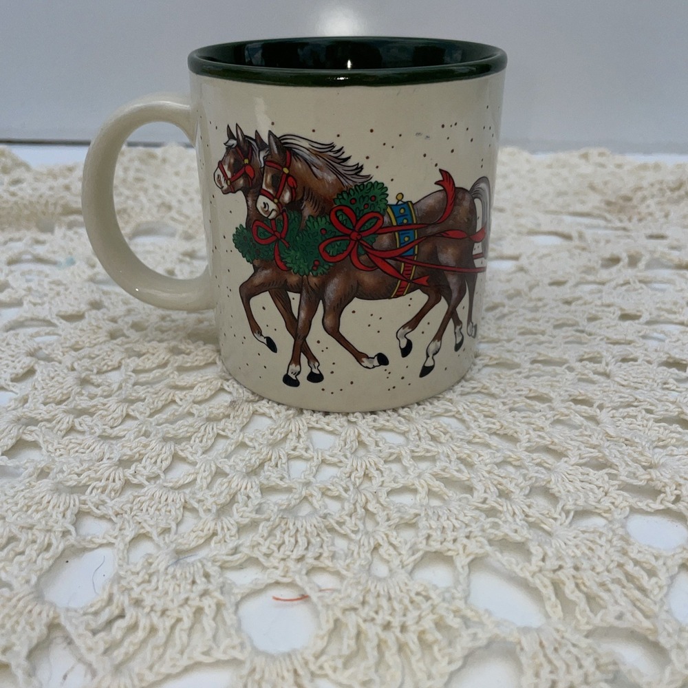 1987 Christmas Mug • Horse-Drawn Sleigh • Gifts • Ribbons • Wreaths •Beige Green